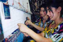 Our weavers work diligently at their masterpieces!