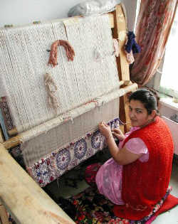 Our weavers work diligently at their masterpieces!