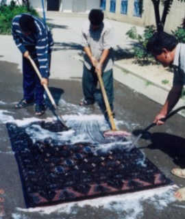 Finally, the carpets are washed.